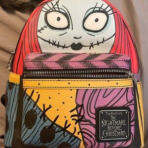 Loungfly Sally backpack used once great condition.